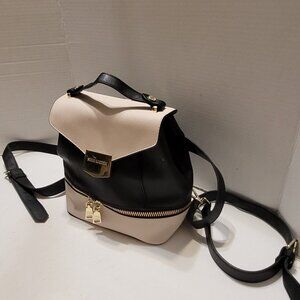 Steve Madden Backpack Purse Black and Cream inside pockets Bag
